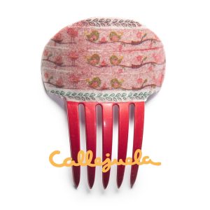 Peineta con adorno de barro