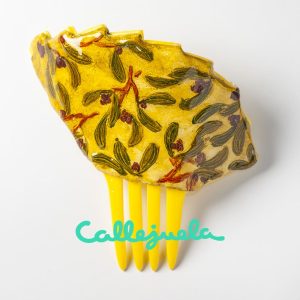 Peineta con adorno de barro