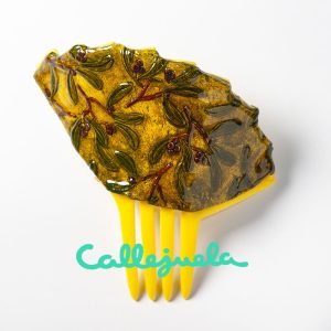 Peineta con adorno de barro