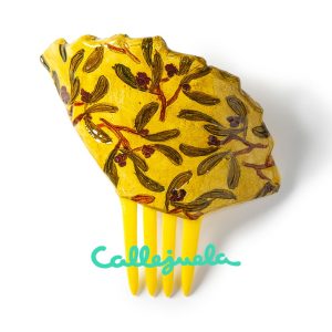 Peineta con adorno de barro