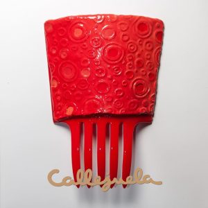 Peineta con adorno de barro