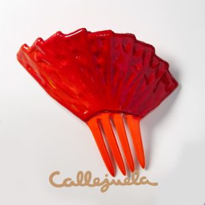 Peineta con adorno de barro