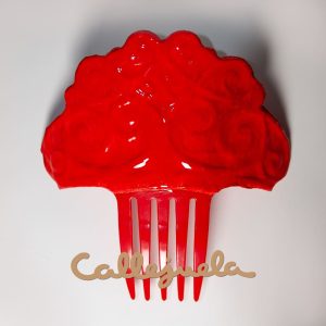 Peineta con adorno de barro