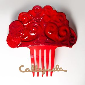 Peineta con adorno de barro