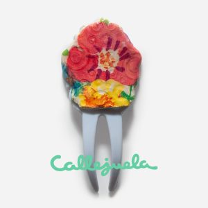 Peineta con adorno de barro